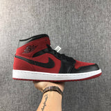 Air Jordan 1 Mid Sneakers in Red, Black and White
