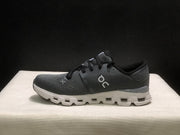 On Cloud X 4 Sneakers in Black and Dark Grey