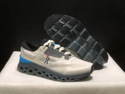 On Cloudstratus 3 Running Shoes in Cream and Gray