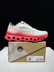 On Cloudmonster Sneakers in Light Gray and Coral