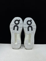 On THE ROGER Clubhouse Pro Tennis Sneakers Black and White
