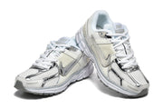 Nike Vomero 5 Sneakers in White and Silver