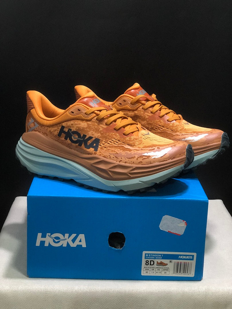 HOKA Stinson 7 Trail Running Shoes in Orange