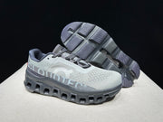 On Cloudmonster Running Shoes in Eclipse and Magnet