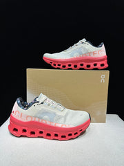 On Cloudmonster Sneakers in Light Gray and Coral