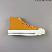 Converse Chuck 70 High Top Sneakers in Mustard