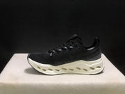 On Cloudsurfer Max Black and White Running Sneakers