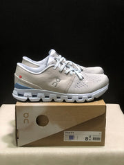 On Cloud X 4 Sneakers in Silver and Blue