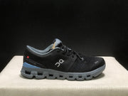 On Cloud X 4 Sneakers in Black and Blue