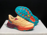 HOKA Speedgoat 5 Trail Running Shoes in Yellow and Coral